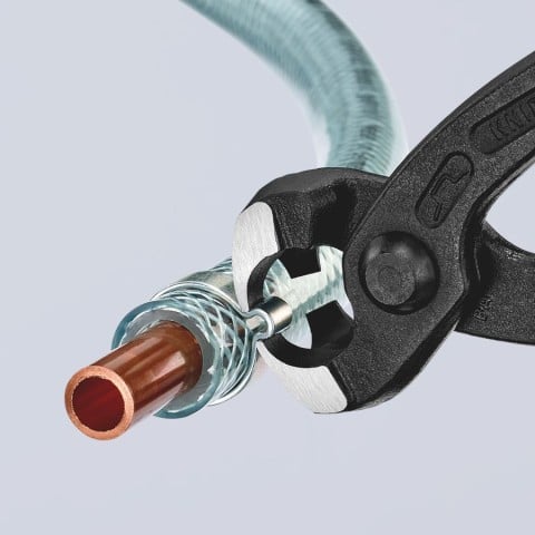Knipex 10 99 I220 Ear Clamp Pliers front jaw clamping an ear clamp on copper tubing