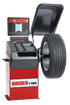 Coats 1185 Wheel Balancer quarter view with tire mounted on spindle