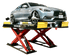 Coats 4TS12OSAR1 12K Alignment Scissor Lift elevated with silver sedan, angle view