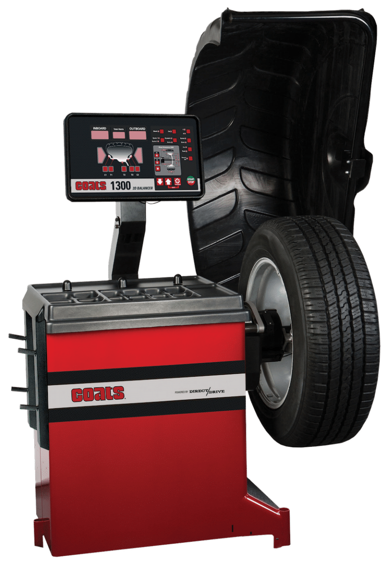 Coats 1300 Direct Drive Wheel Balancer full view with mounted tire