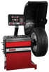 Coats 1300 2D Direct Drive Wheel Balancer with tire, angled view