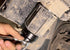 Lisle 13340 DEF Filter Socket being used with a ratchet to remove a DEF canister filter on a truck