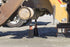 AME International 14415 20-Ton OTR Jack Stands in use under heavy commercial vehicle