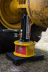 AME International 14466 Titan Jack Plate in use under heavy equipment with cribbing block