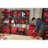Milwaukee PACKOUT Compact Wall Plate lifestyle photo showing full modular storage system in a workshop