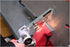 Astro Pneumatic 3037 Air Belt Sander removing spot welds from metal panel with sparks