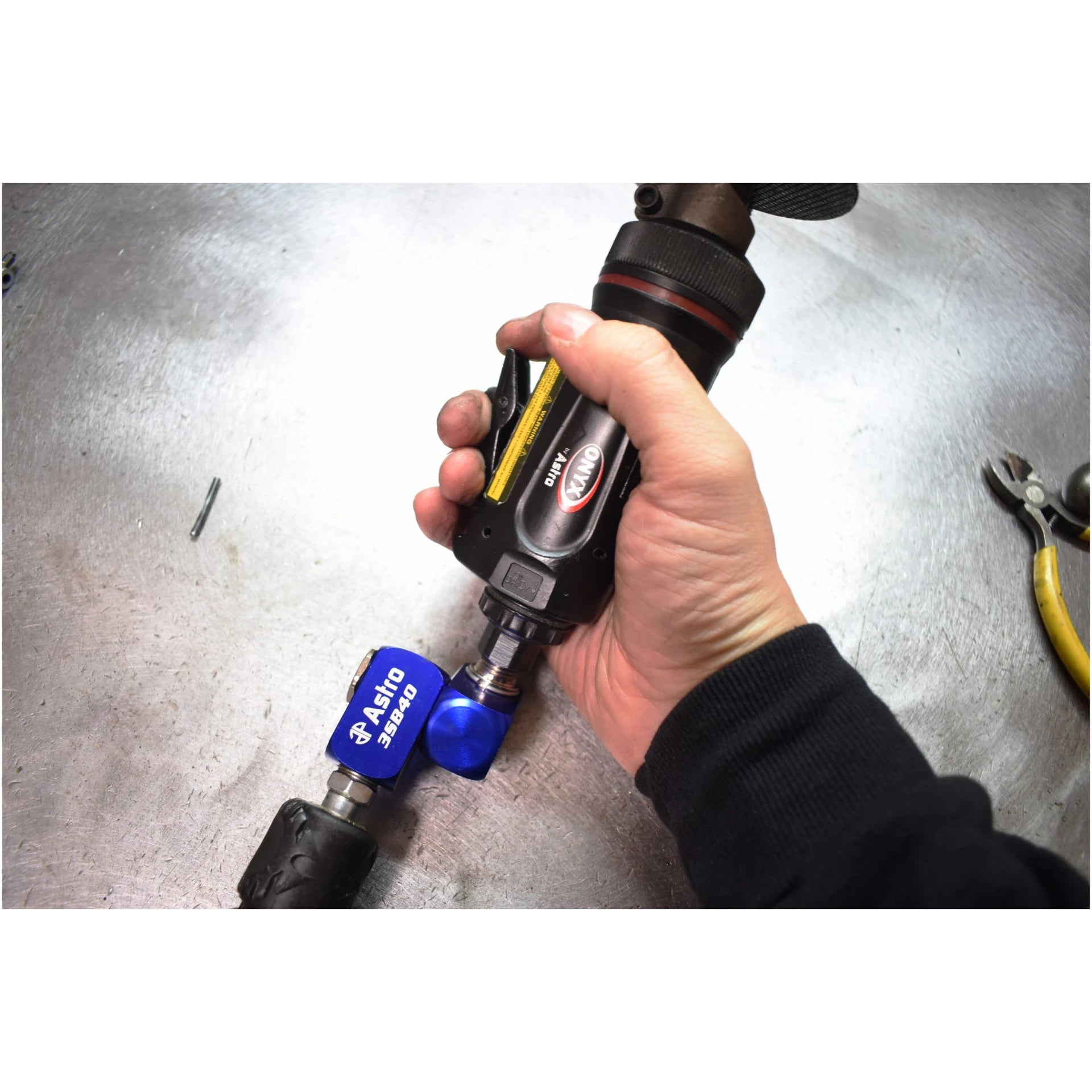 Astro Pneumatic 3SB40 Air Swivel in use with Astro ONYX impact wrench - lifestyle angle view
