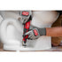 Milwaukee Tool 2525-20 M12 Brushless Rotary Tool in use on a plumbing application near a toilet base