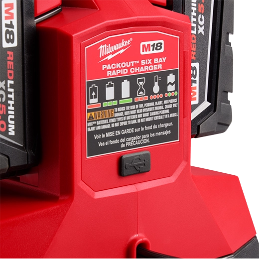 Milwaukee Tool M18 PACKOUT Six Bay Rapid Charger - close-up of product label and USB port