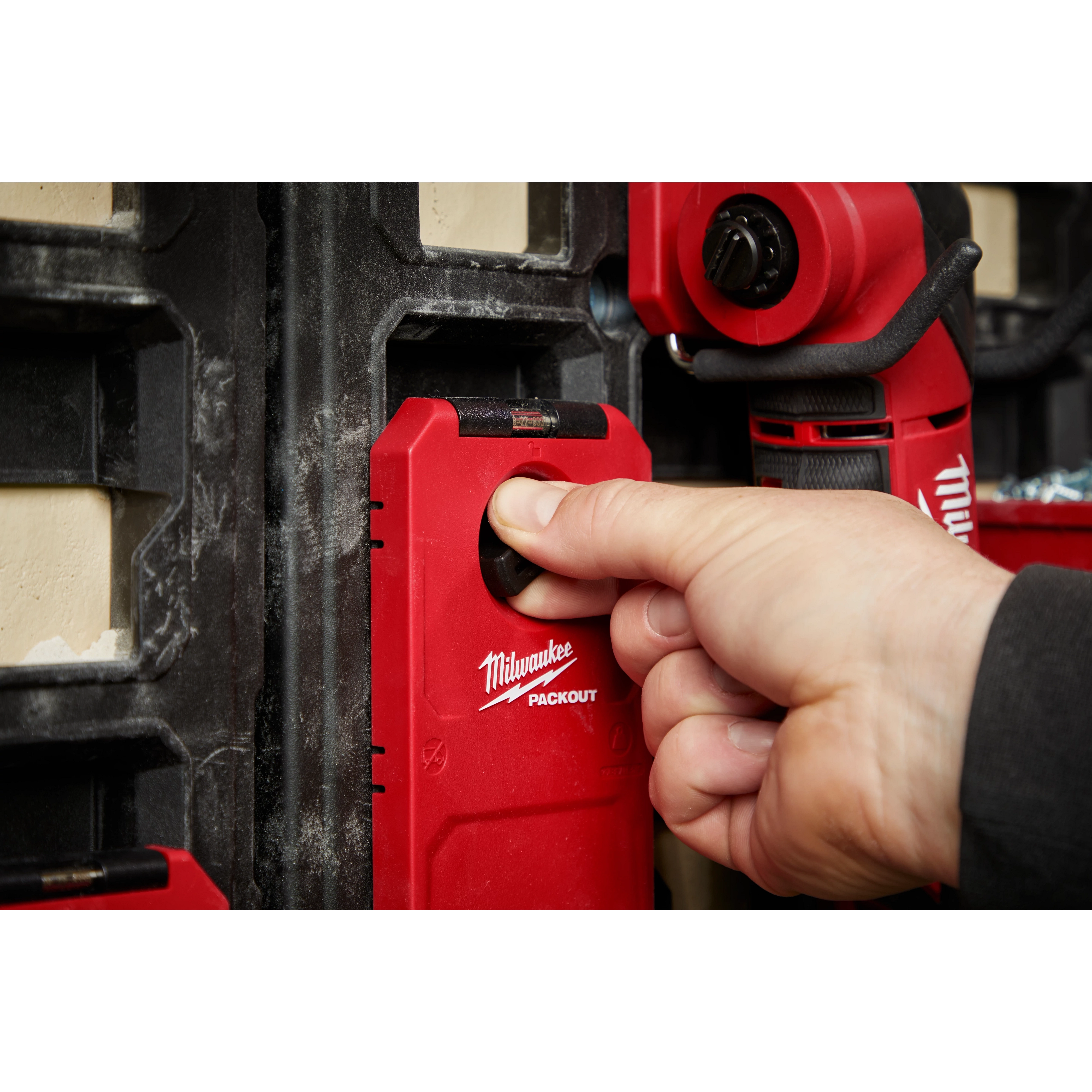 Milwaukee PACKOUT Curved Hook storing cords and hoses