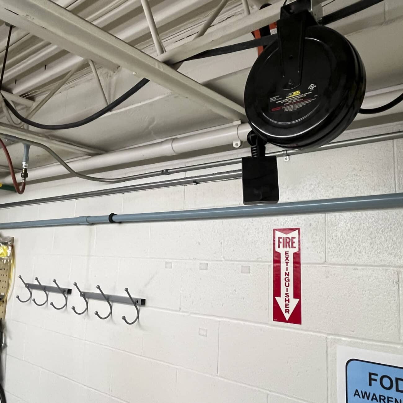 Alert Stamping ALT-5020TF-4C Retractable Cord Reel ceiling-mounted in workshop application
