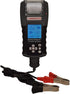 Associated Equipment 12-2415 Graphical Hand Held Battery Tester with Printer, showing LCD display, navigation buttons, integrated thermal printer, and red and black clamp leads