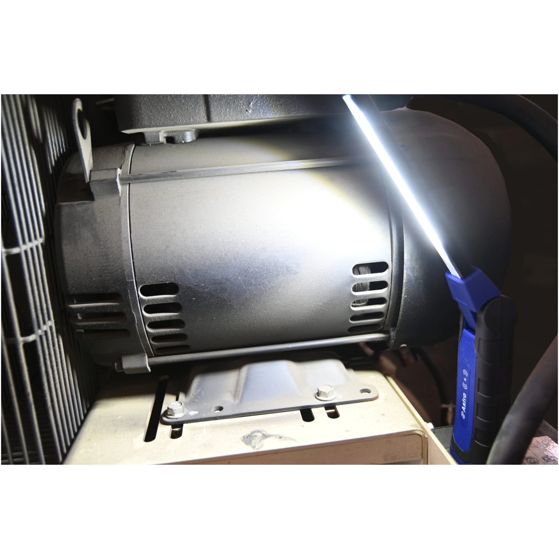 Astro Pneumatic 52SLMAX LED Slim Light lighting up motor in tight workspace