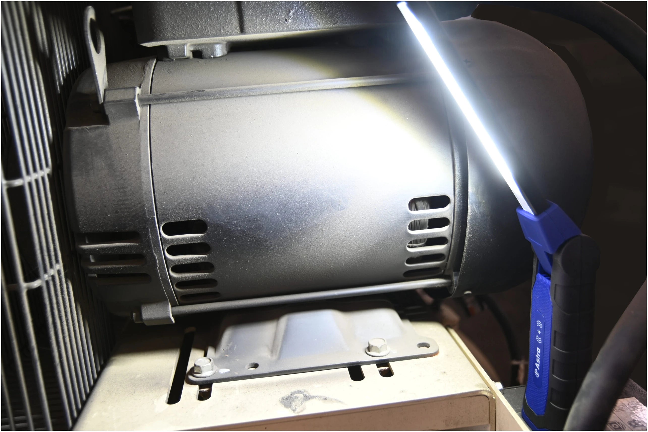 Astro Pneumatic 52SLMAX LED Slim Light in use, illuminating vehicle engine compartment