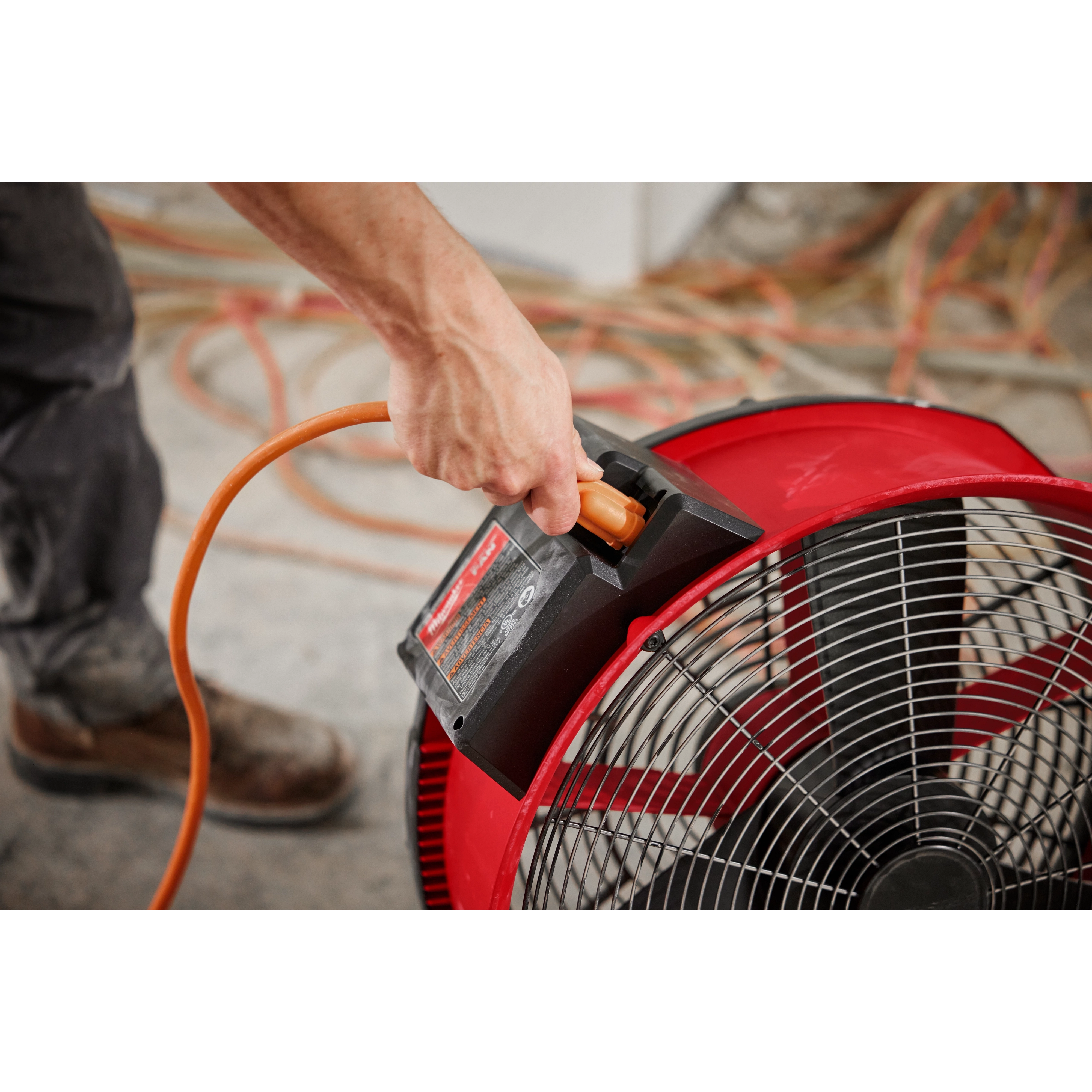 Milwaukee Tool 0821-20 M18 Brushless 18" Fan - AC extension cord plug-in lifestyle shot on job site