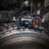 Sunex Tools SX01026 1" Drive Impact Wrench with 6" Extended Anvil resting on truck tire