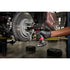 Milwaukee Tool M12 FUEL Stubby Impact Wrench with Protective Boot working on brake rotor in auto shop