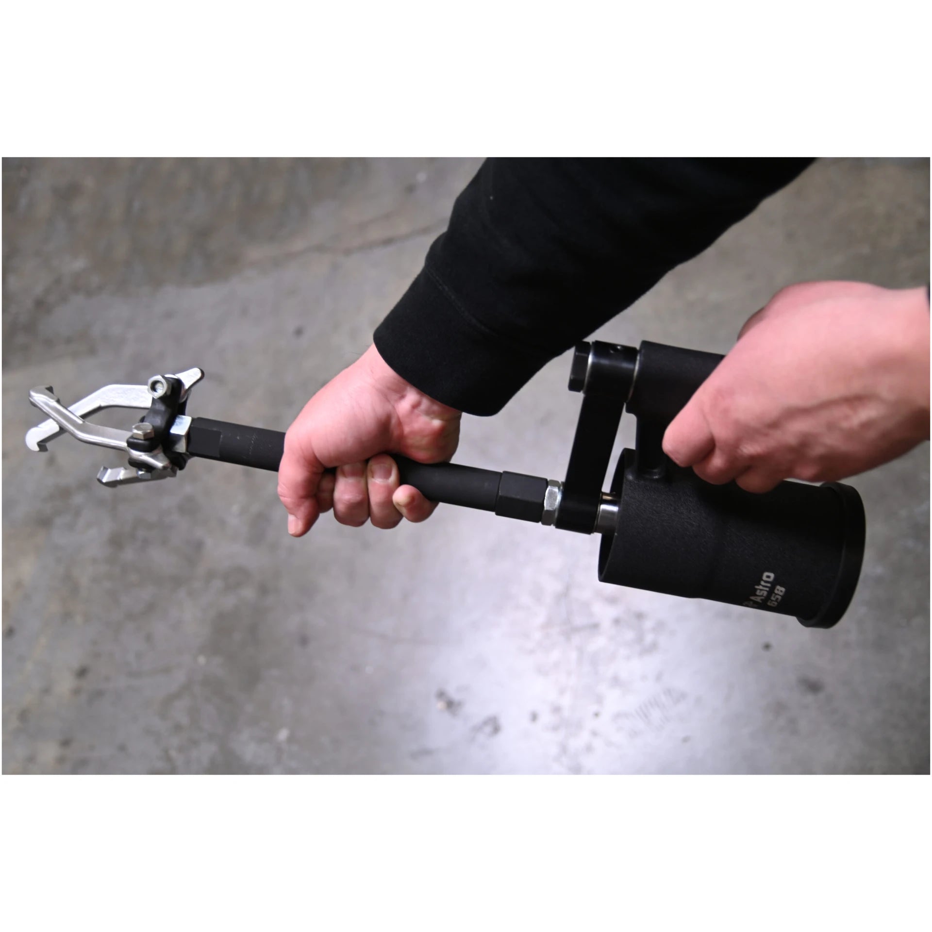 Astro Pneumatic 658 Stubby Air Slide Hammer in use with pilot bearing puller attachment
