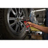 Milwaukee Tool M12 FUEL Stubby Impact Wrench with Protective Boot used in automotive tire shop
