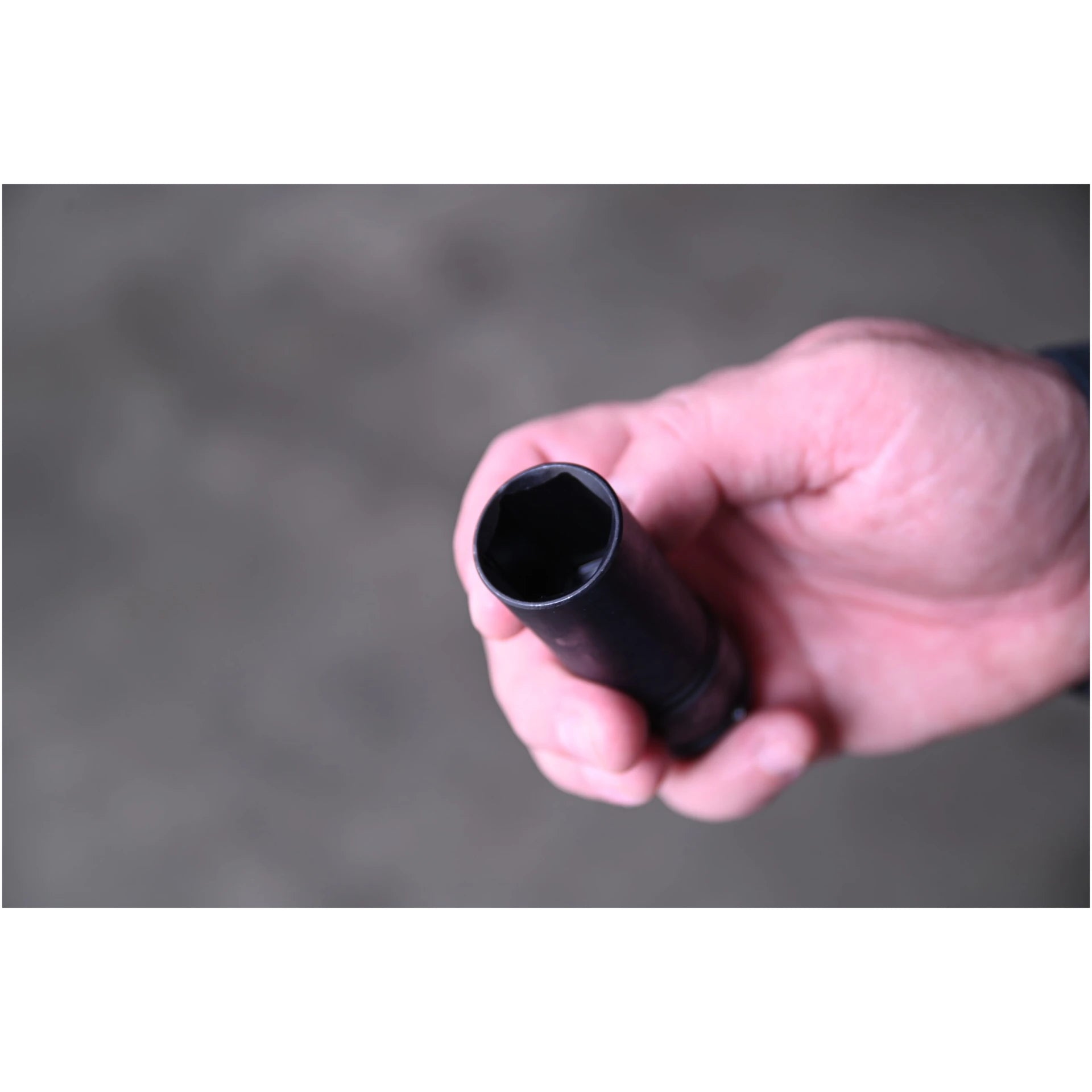 Astro Pneumatic 78204 thin wall lug nut socket top view held in hand showing six-point interior