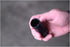 Close-up top view of Astro Pneumatic thin wall lug nut socket held in hand showing hex opening
