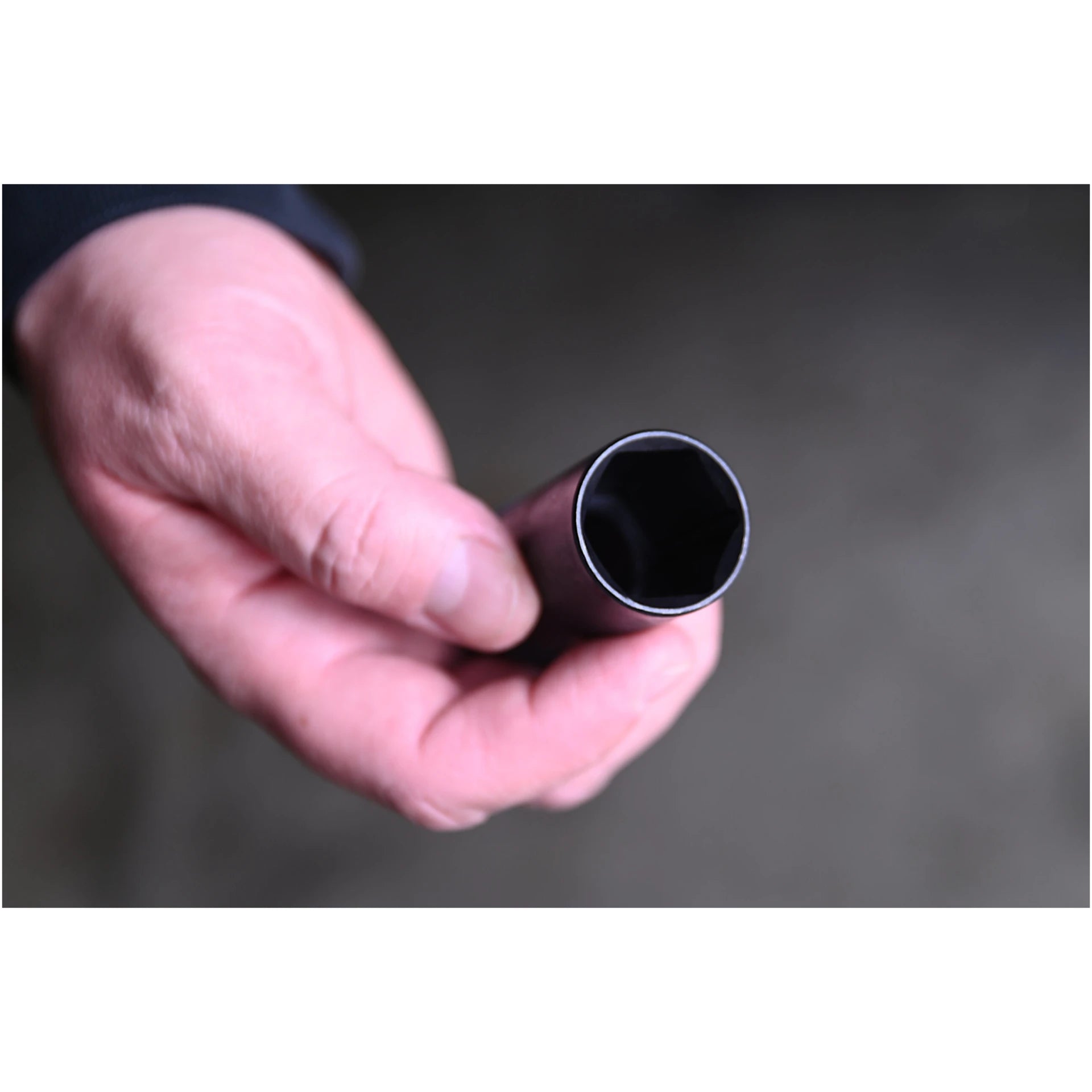Astro Pneumatic 78204 thin wall socket drive end close-up held in hand showing 1/2 inch square drive