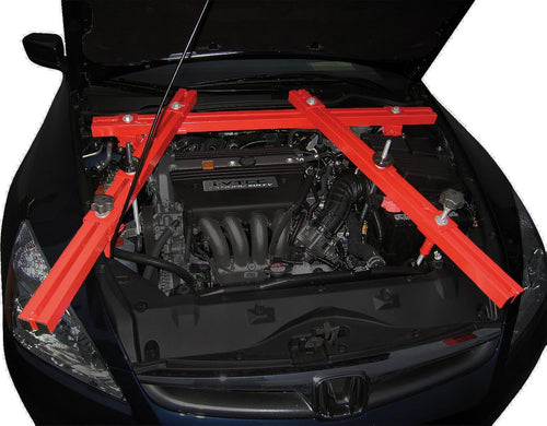 Norco 78099 Heavy Duty 4 Point Engine Support Tool installed on Honda engine bay, red steel transverse bars resting on shock strut towers