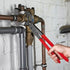 Knipex Cobra XL Water Pump Pliers in use gripping pipe fittings