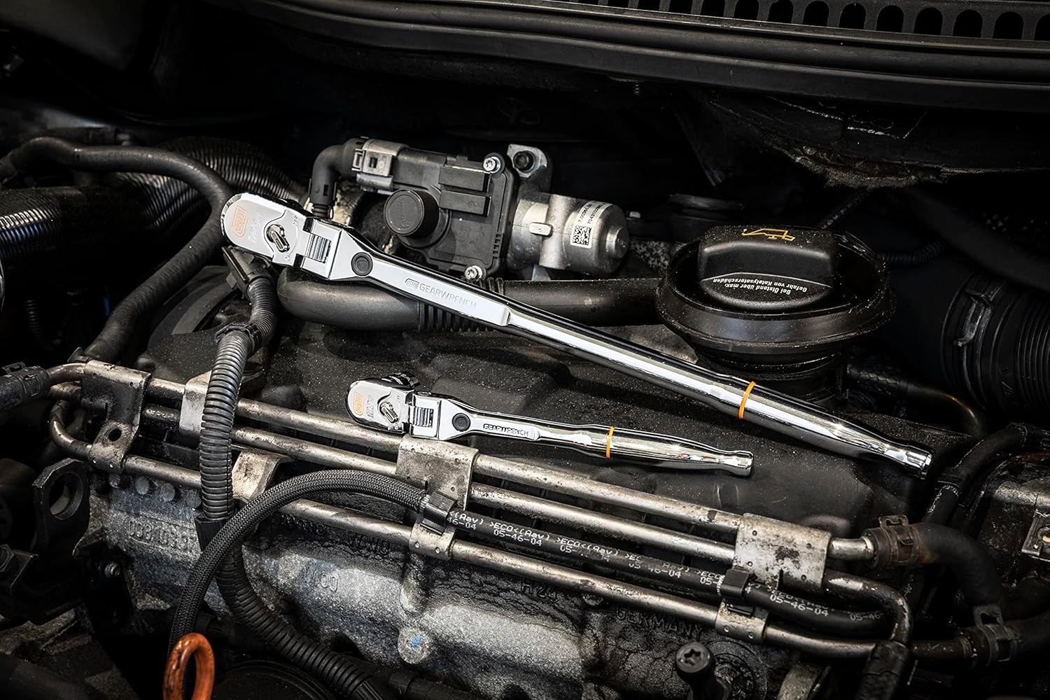 Gearwrench 120XP 2-piece flex head ratchet set resting in engine bay