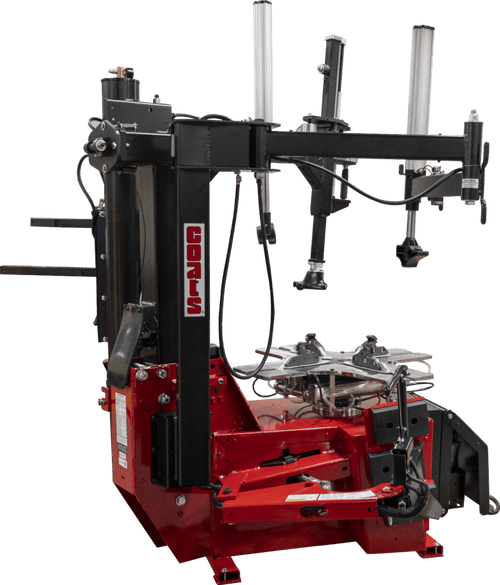 Coats APX90E Rim Clamp Tire Changer side view showing tower and rim clamp assembly