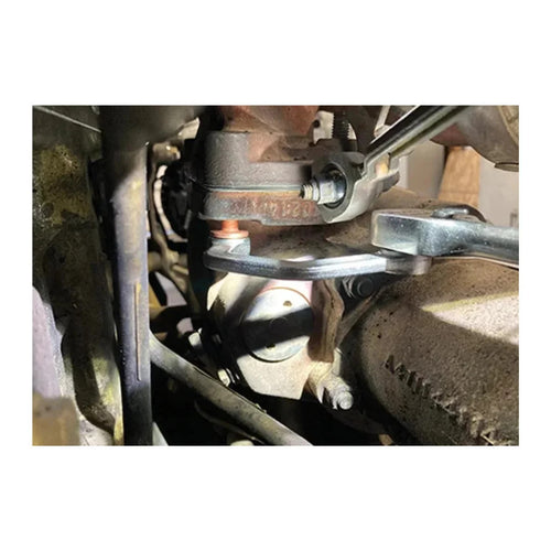 Assenmacher BY13 13mm Bypass Wrench in use accessing Detroit Diesel turbo bolts around engine obstructions