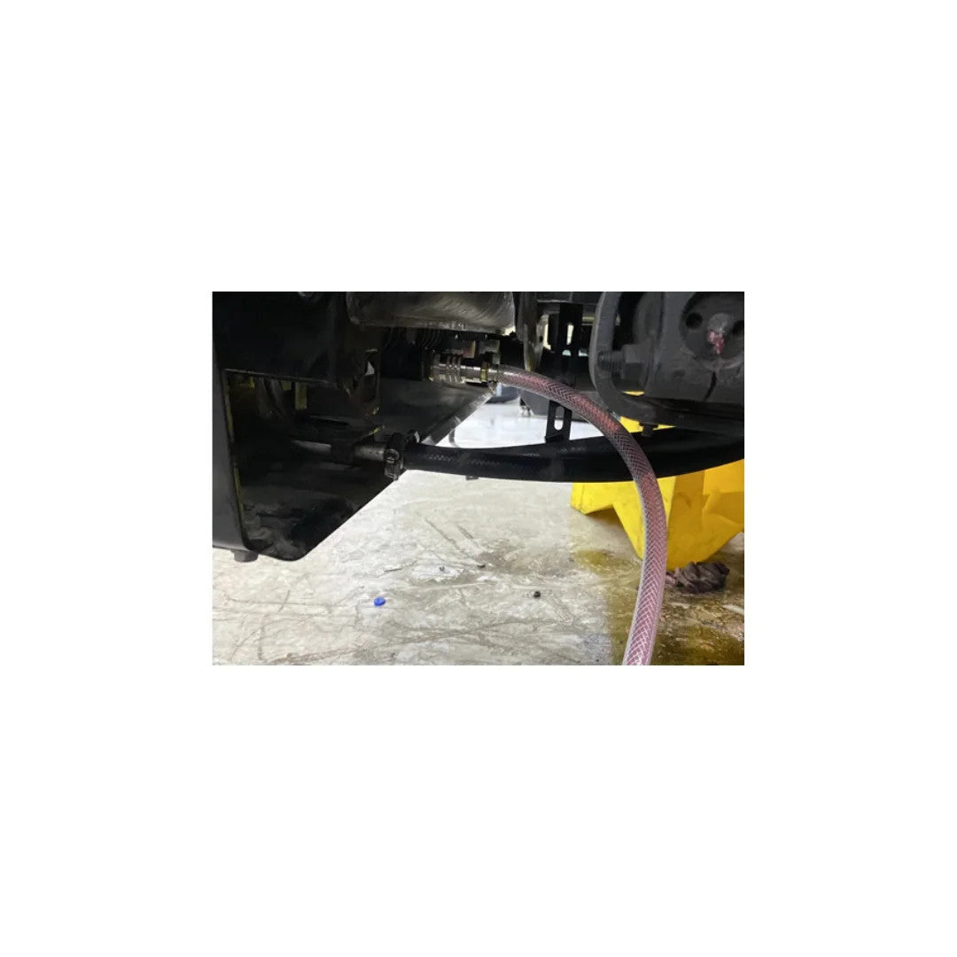 VTC100 coolant drain hose attached to truck radiator quick-connect fitting during in-use service