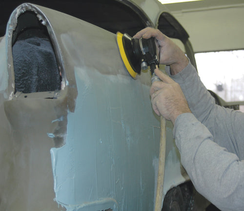 ATD Tools ATD-2088 Random Orbital Palm Sander in use on automotive body panel during paint prep