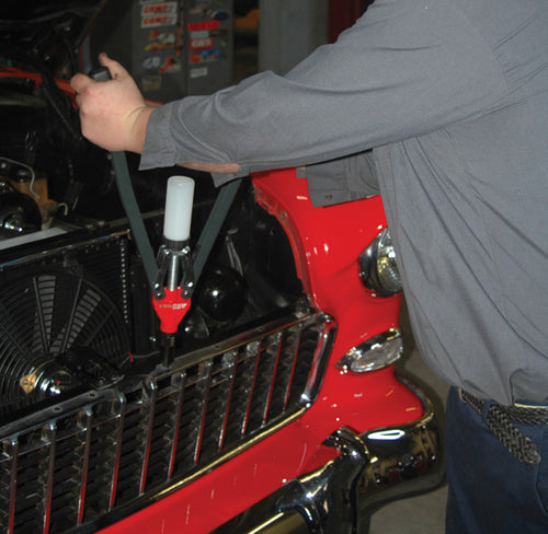ATD Tools 5842 1/4" Heavy-Duty Hand Riveter in use on a classic car