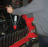 ATD Tools 5842 1/4" Heavy-Duty Hand Riveter in use on a classic car