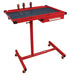 ATD Tools 7012 Heavy-Duty Mobile Work Table with Drawer in red, showing top tray with liner and storage drawer