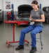 ATD Tools 7012 Heavy-Duty Mobile Work Table with Drawer in use in an auto repair shop with tools on tray