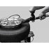 Technician using Coats ABS Auxiliary Bead Sealer on a tire mounted to a tire changer