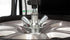 Coats 90C center clamp locking mechanism close-up on alloy wheel