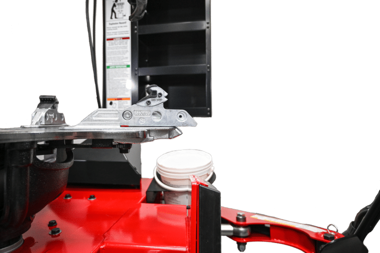 Coats Maxx 70 Tire Changer rim clamp mechanism close-up
