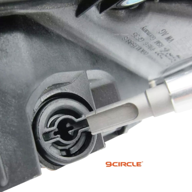 9 Circle drain plug removal tool in use on VW engine component