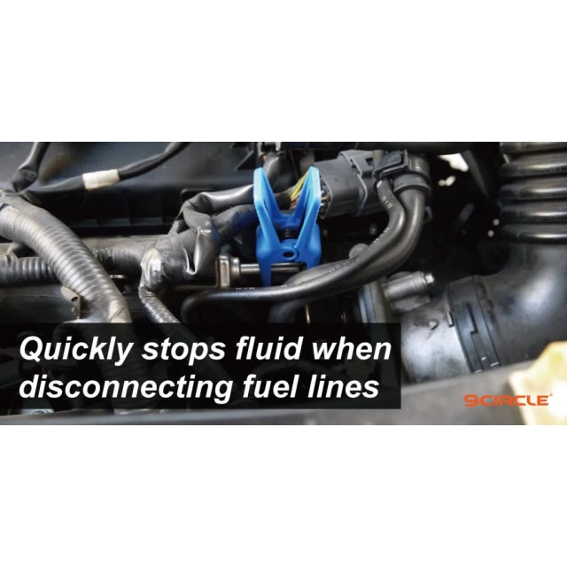 9 Circle 41112 fluid stopper clipped onto fuel line in engine bay