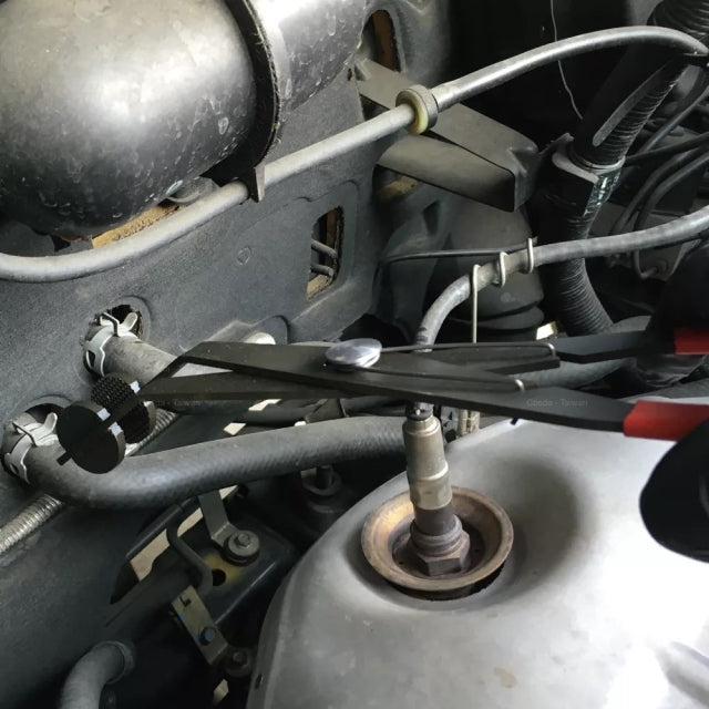 9 Circle 9CL-41172 Long Reach Pliers reaching deep into a confined engine compartment