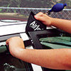 Access Tools FACOS - air jack wedge being positioned at car door for lockout opening