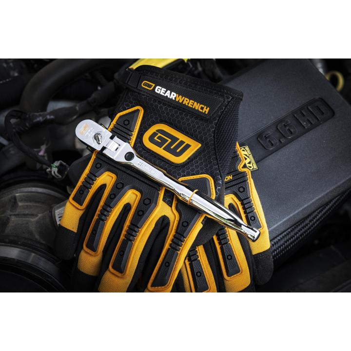 Gearwrench 81054 120XP Locking Flex Head Ratchet resting on work glove near engine bay