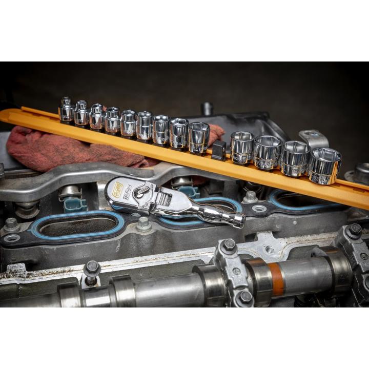 Gearwrench 81212XP stubby flex head ratchet in use on engine valve cover with socket set