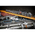 Gearwrench 81212XP stubby flex head ratchet in use on engine valve cover with socket set