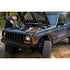Mechanic working on a Jeep Cherokee engine with the Gearwrench GWGMTK184 tool kit on the fender