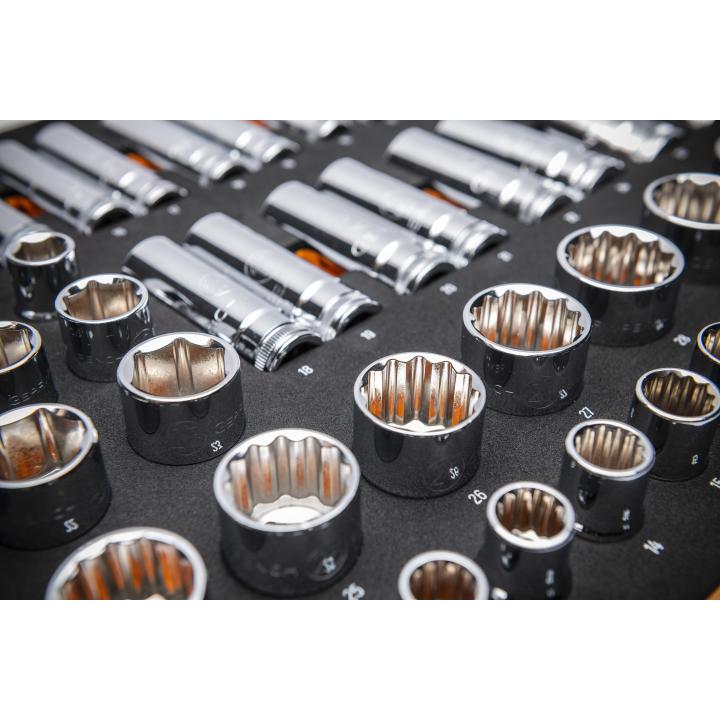 Close-up of full polish chrome sockets organized in orange and black foam storage tray