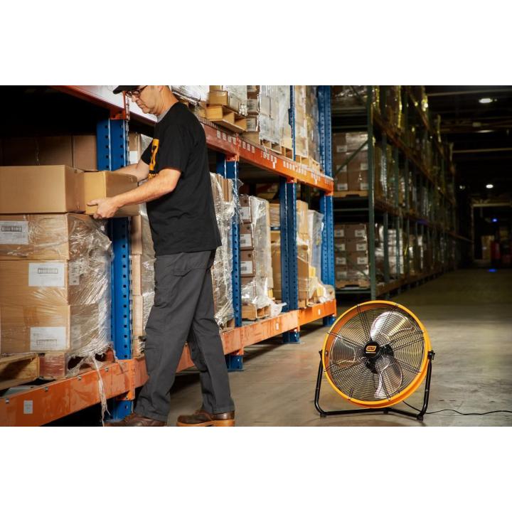 Gearwrench GWSFAN20 20" shop fan in use in a warehouse